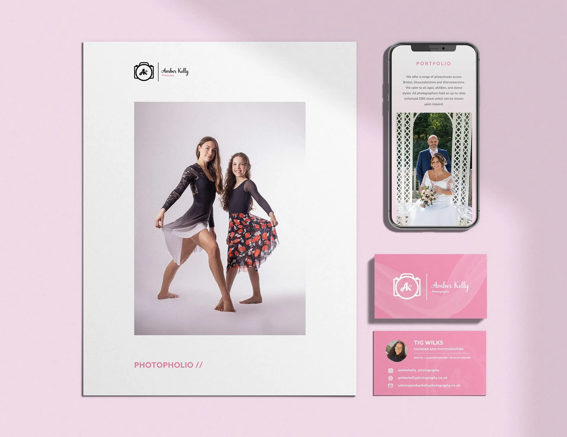 A portfolio for Amber Kelly Photography, featuring a business card, a phone screen with a wedding photo, and a larger photo of a mother and daughter in dance poses.
