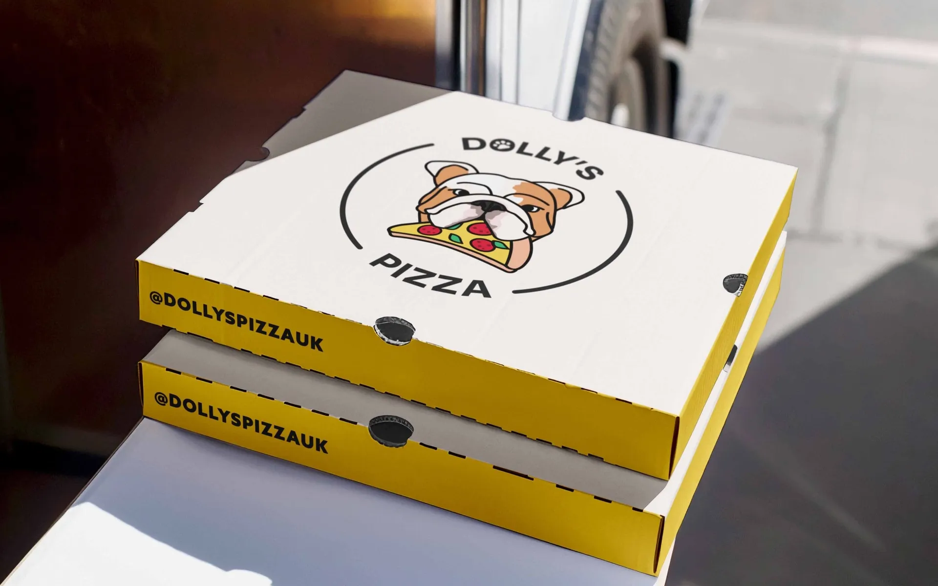 Dolly's Pizza product and brand presentation by Berlew Design Studio.
