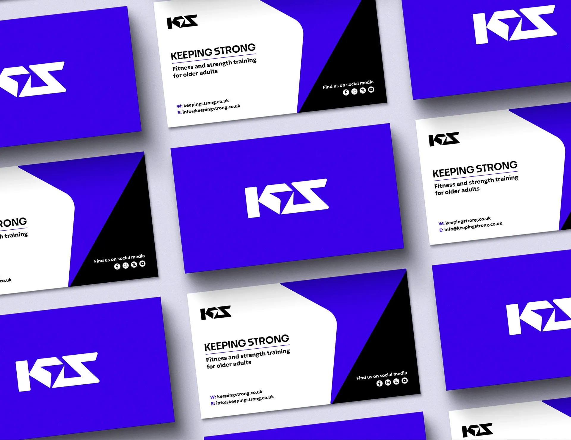 A collection of business cards for Keeping Strong, a fitness and strength training company for older adults, featuring a white and black logo on a purple background.